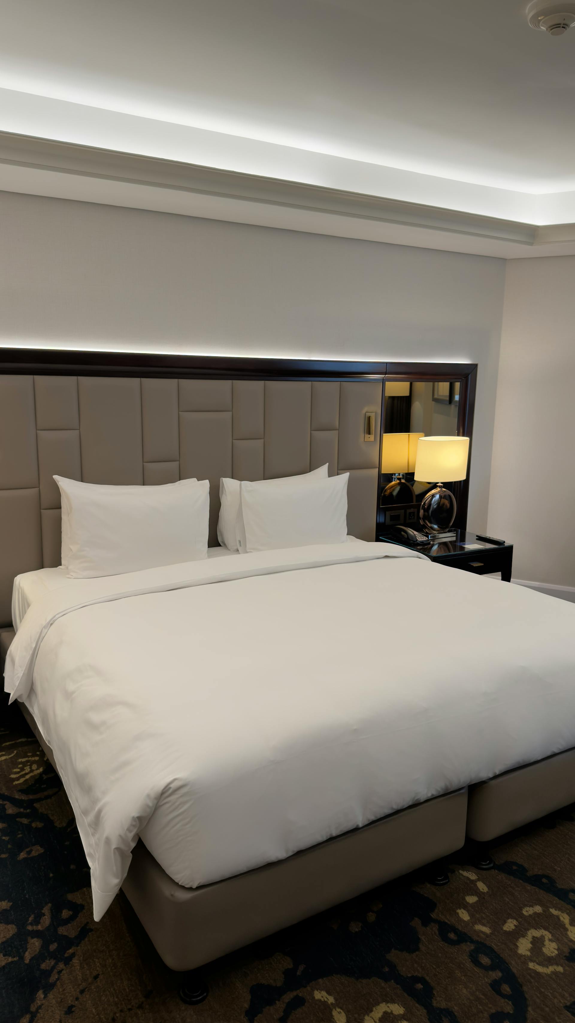 Hotel suite with hospitality-grade linens